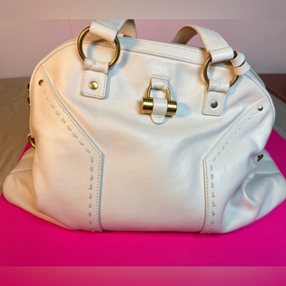 Yves Saint Laurent Black and Gold Interior - Picture 12 of 15